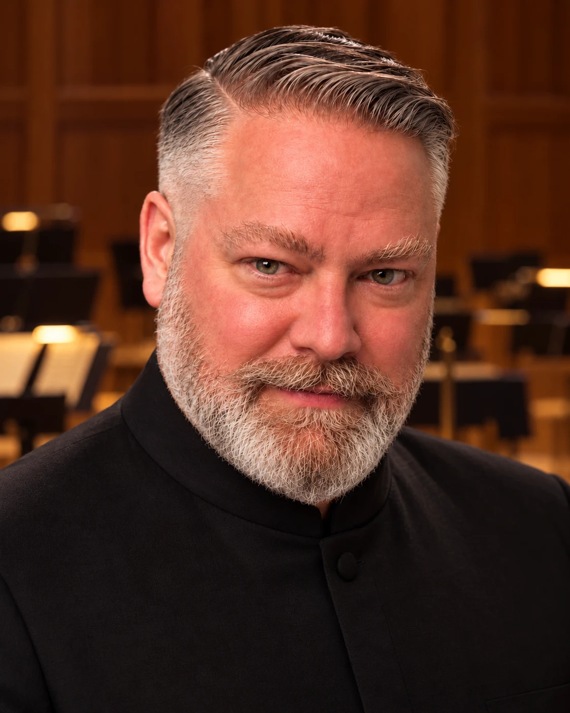 Seán Boulware in a black mandarin-collar concert jacket