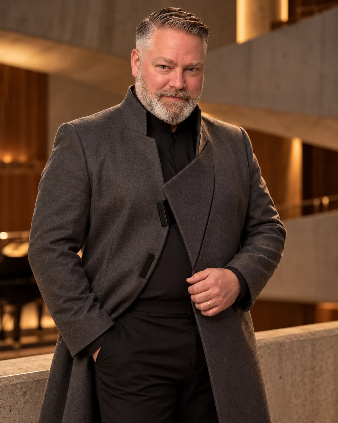 Seán Boulware in a graphite-gray performance coat